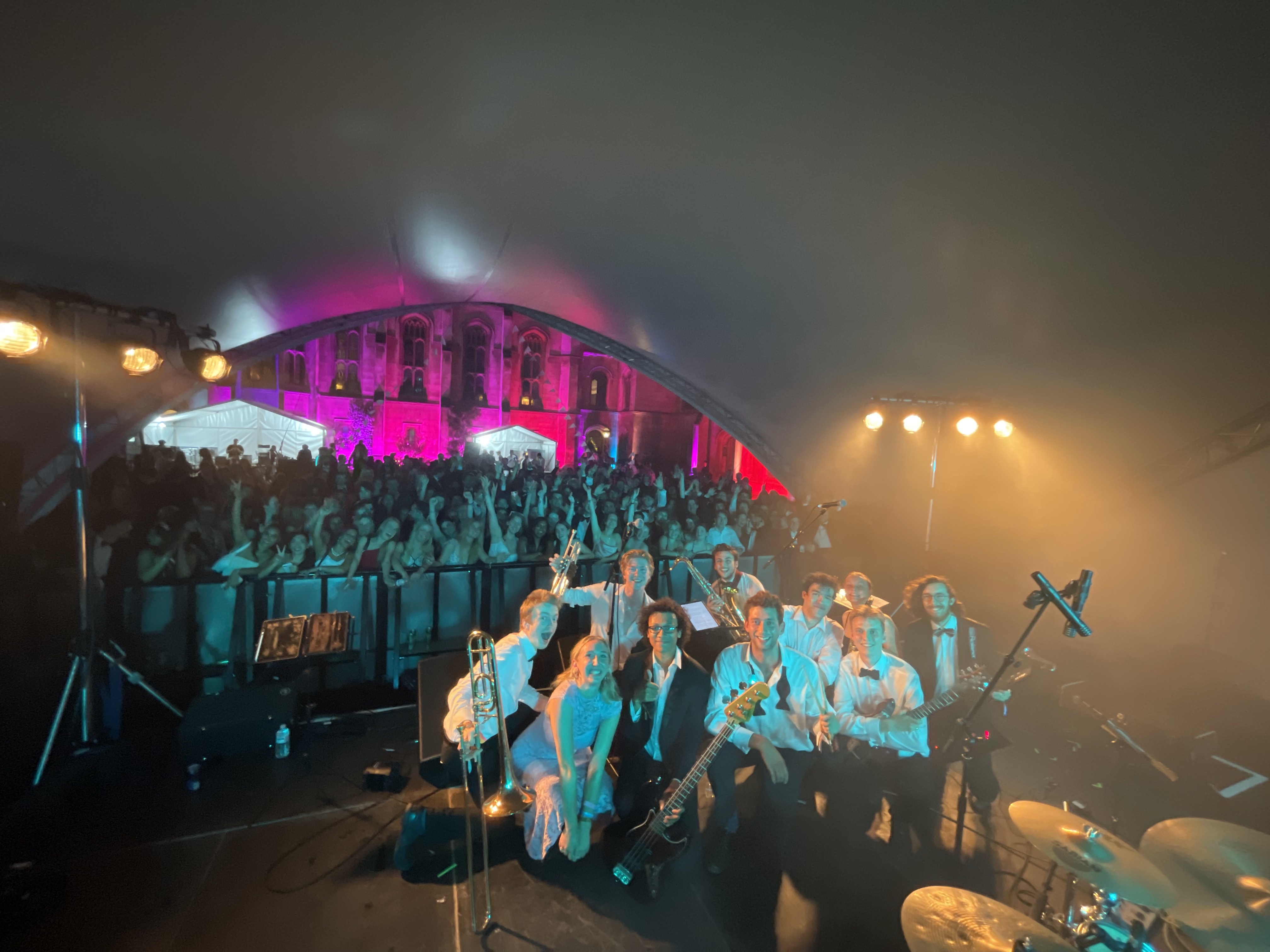 jonathan parapadakis playing tenor saxophone with hot content function band at a may ball event