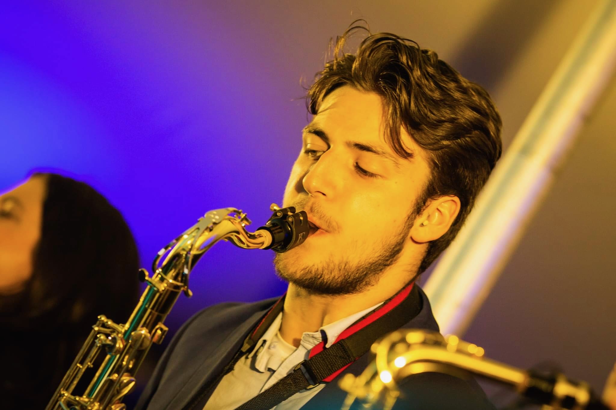 Jonathan Parapadakis playing tenor saxophone with Hot Content for a function band gig