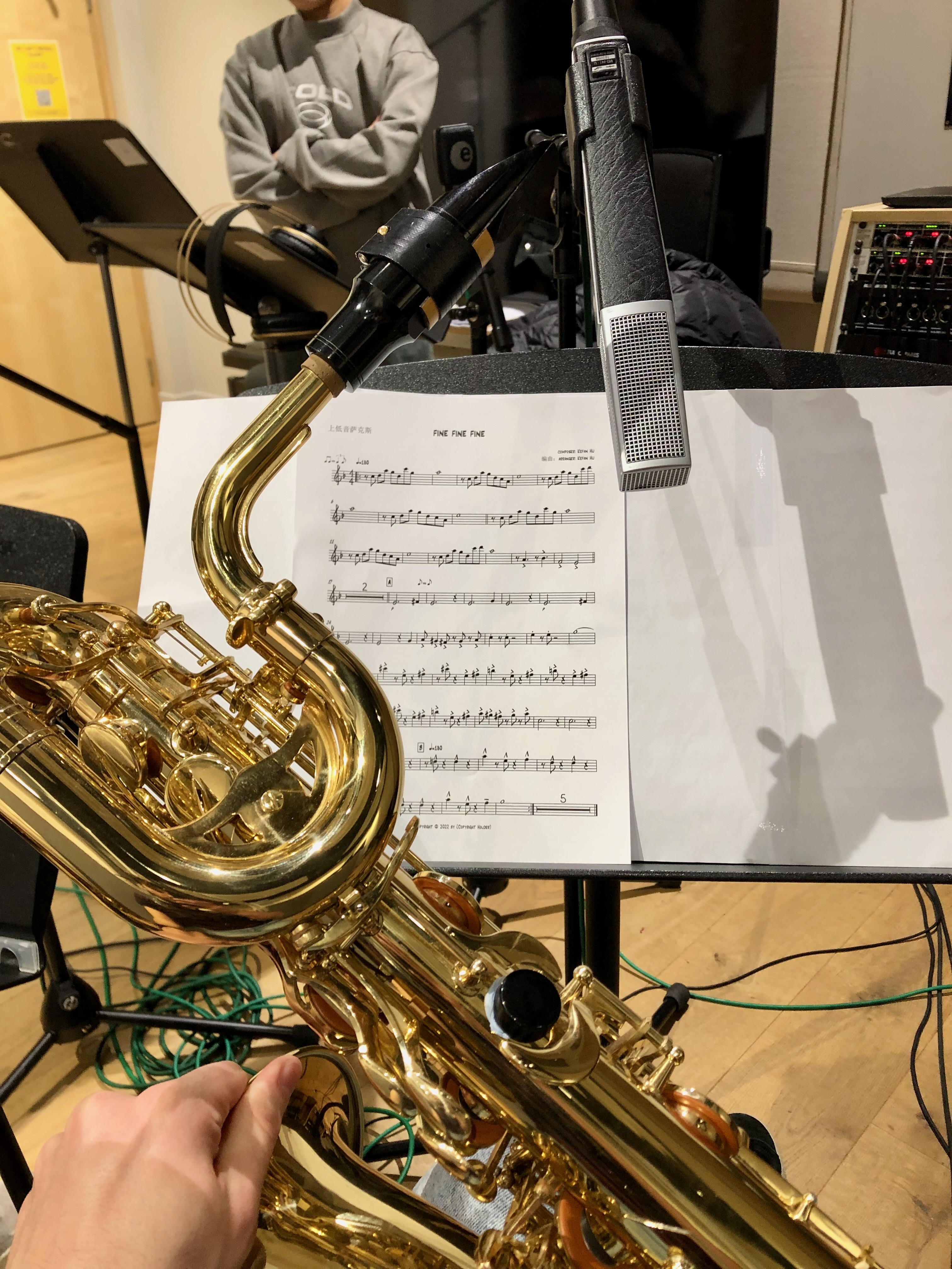 jonathan parapadakis playing bari sax in a jazz studio recording session