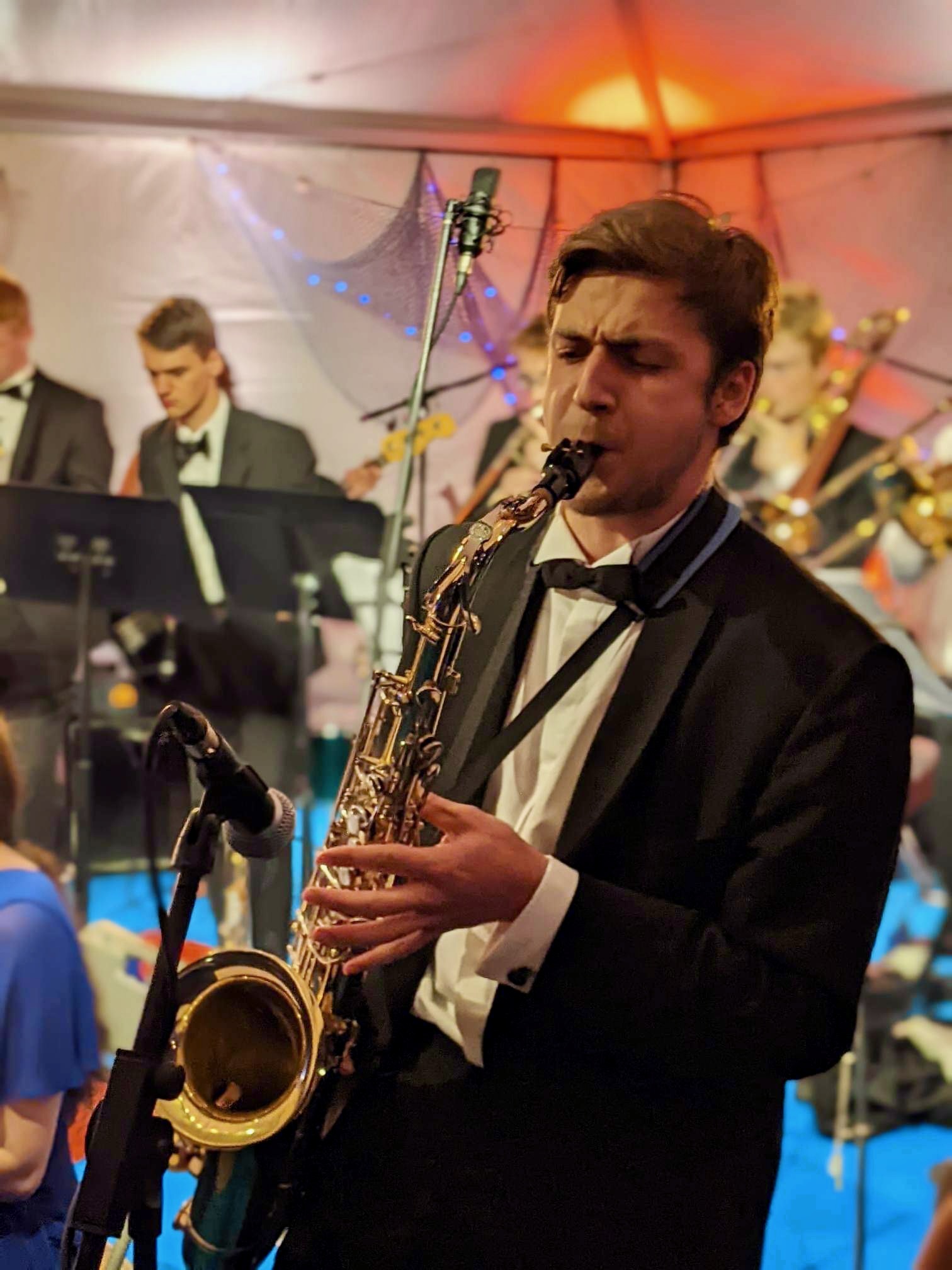 Jonathan Parapadakis playing tenor saxophone with Churchill jazz band for a big band jazz band gig
