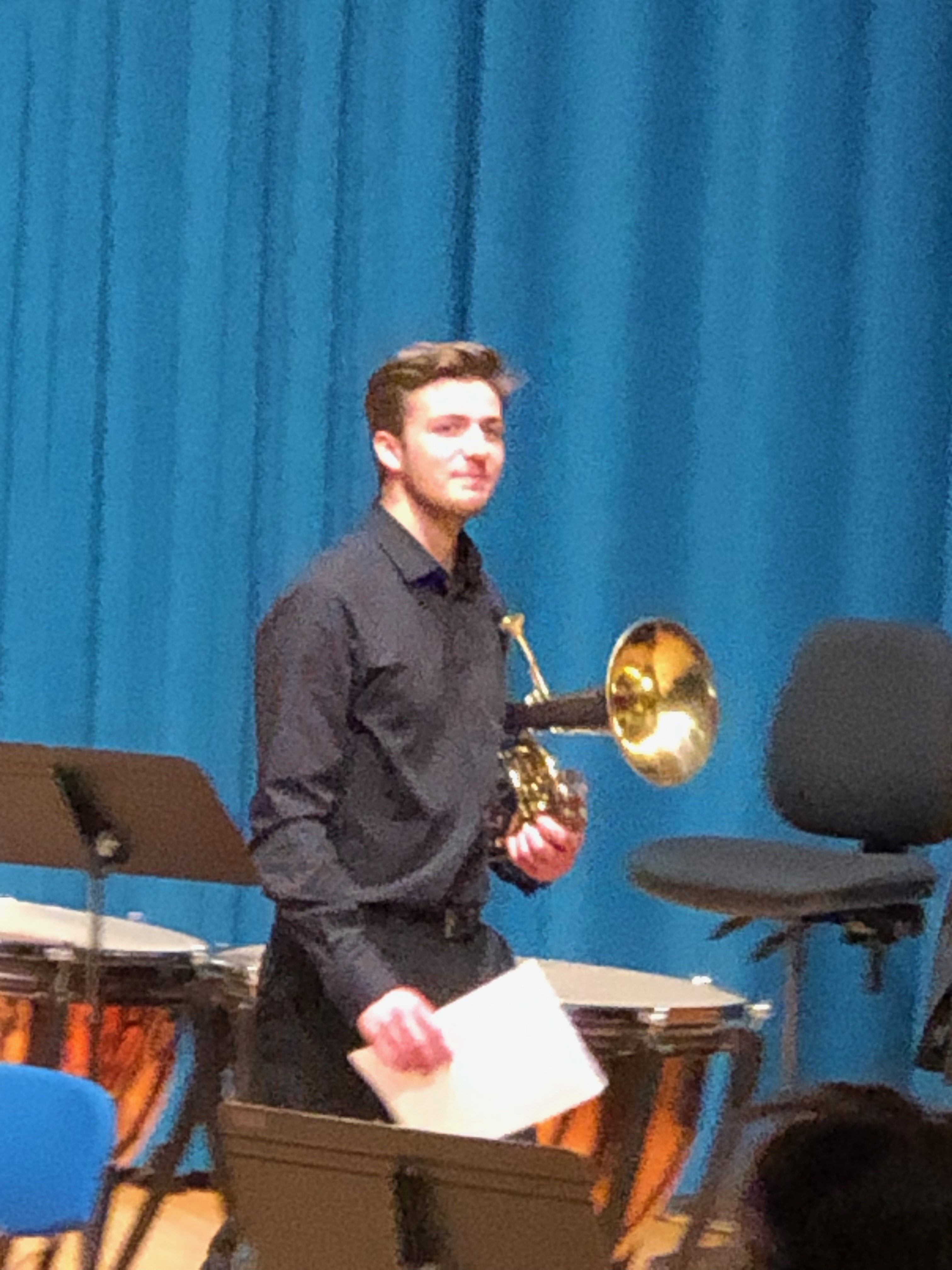 Jonathan Parapadakis holding baritone horn for university wind orchestra gig
